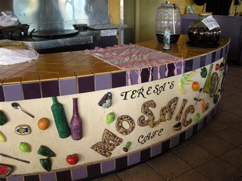 Teresa's mosaic cafe - and last updated 7:18 PM, Jan 02, 2024. TUCSON, Ariz. (KGUN) — Teresa’s Mosaic Cafe has finally reopened after an attic fire left behind extensive damage. The family had to rebuild, but took ...